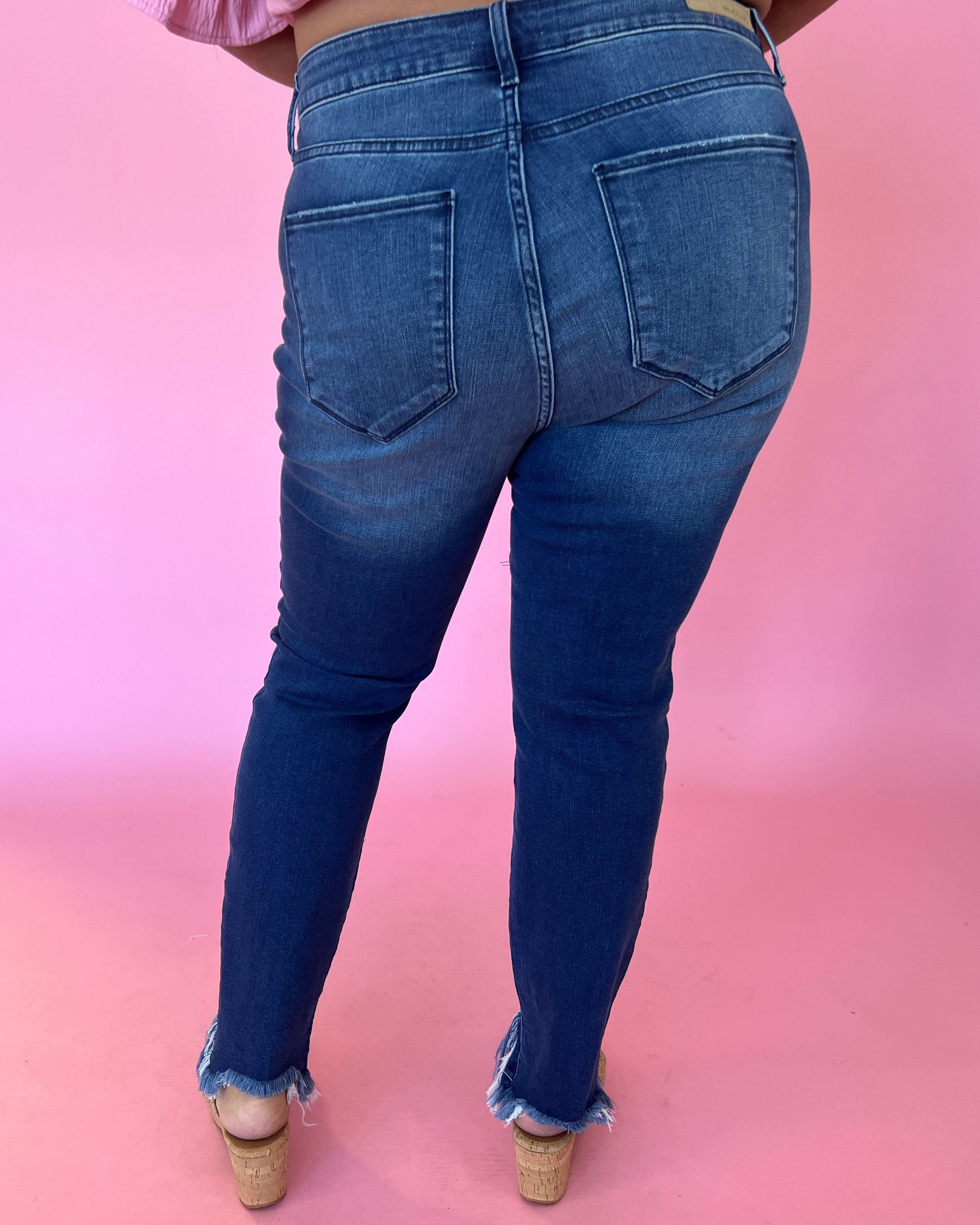 Can’t Make Me Plus Dark Denim Slanted Fray Hem Jeans-Shop-Womens-Boutique-Clothing