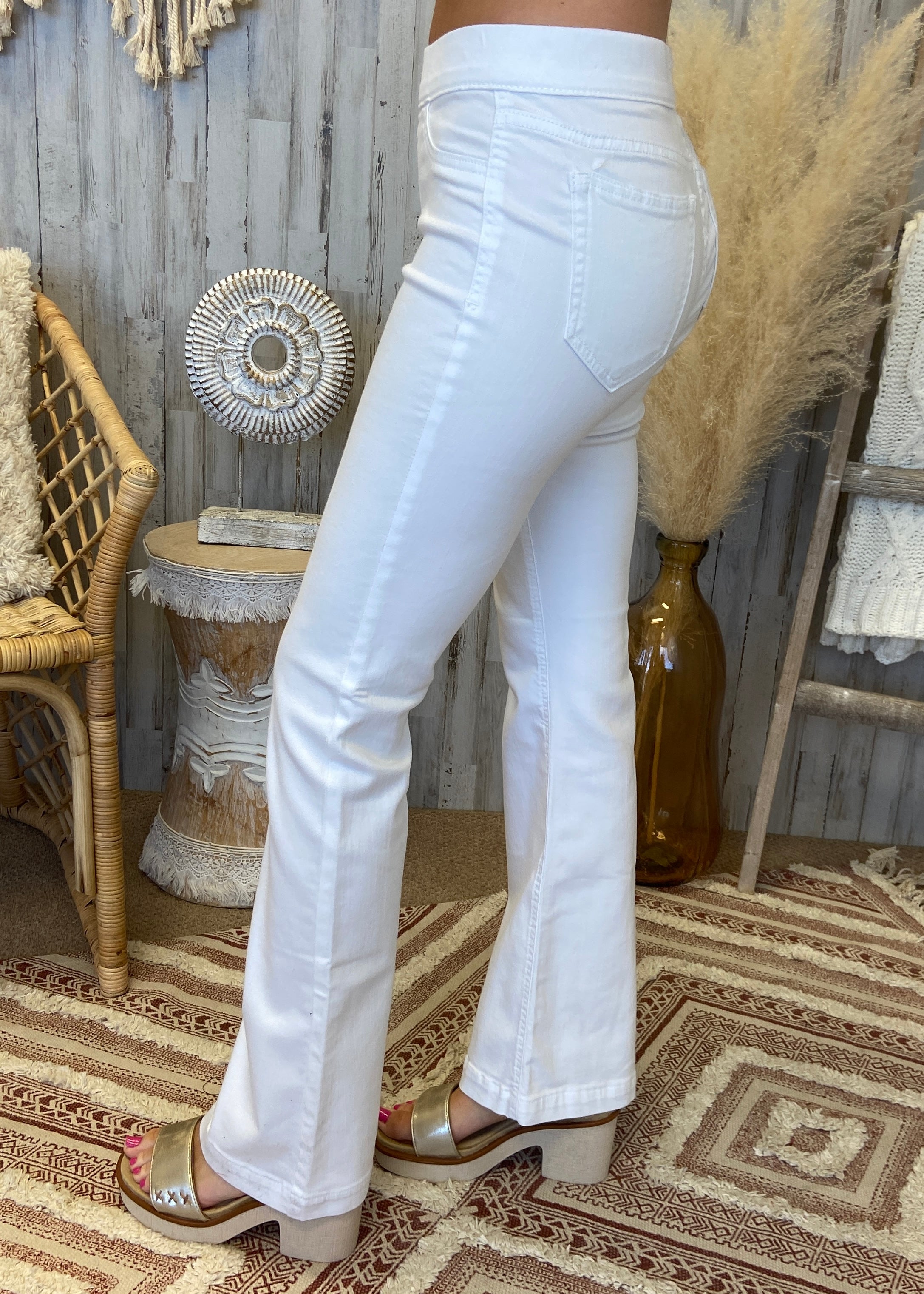 WHITE MID RISE FLARE JEANS